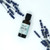 Mint Cleaning Laundry Day Essential Oil | 30 ml - picture of bottle surrounded by lavender Mint Cleaning Laundry Day Essential Oil | 30 ml - picture of bottle surrounded by lavender