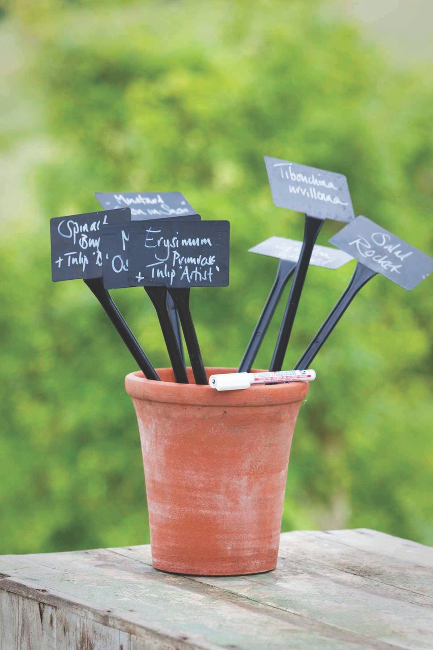 Black plant labels and white pen