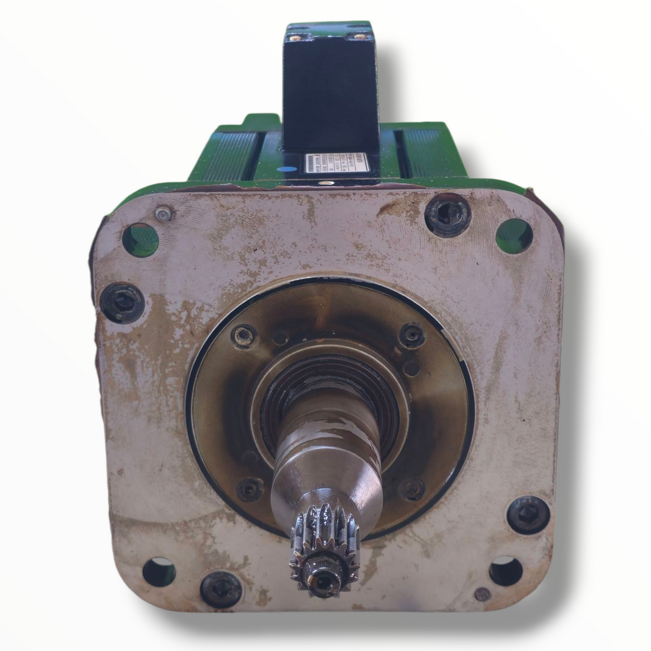 Original Yaskawa nameplate/label with model number details attached.

Shaft and housing visible, consistent with heavy-duty industrial use.

Paint wear around shaft area, but overall structure intact.