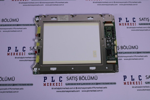 Rear side of LQ9D011 display with SHARP label and connector layout.