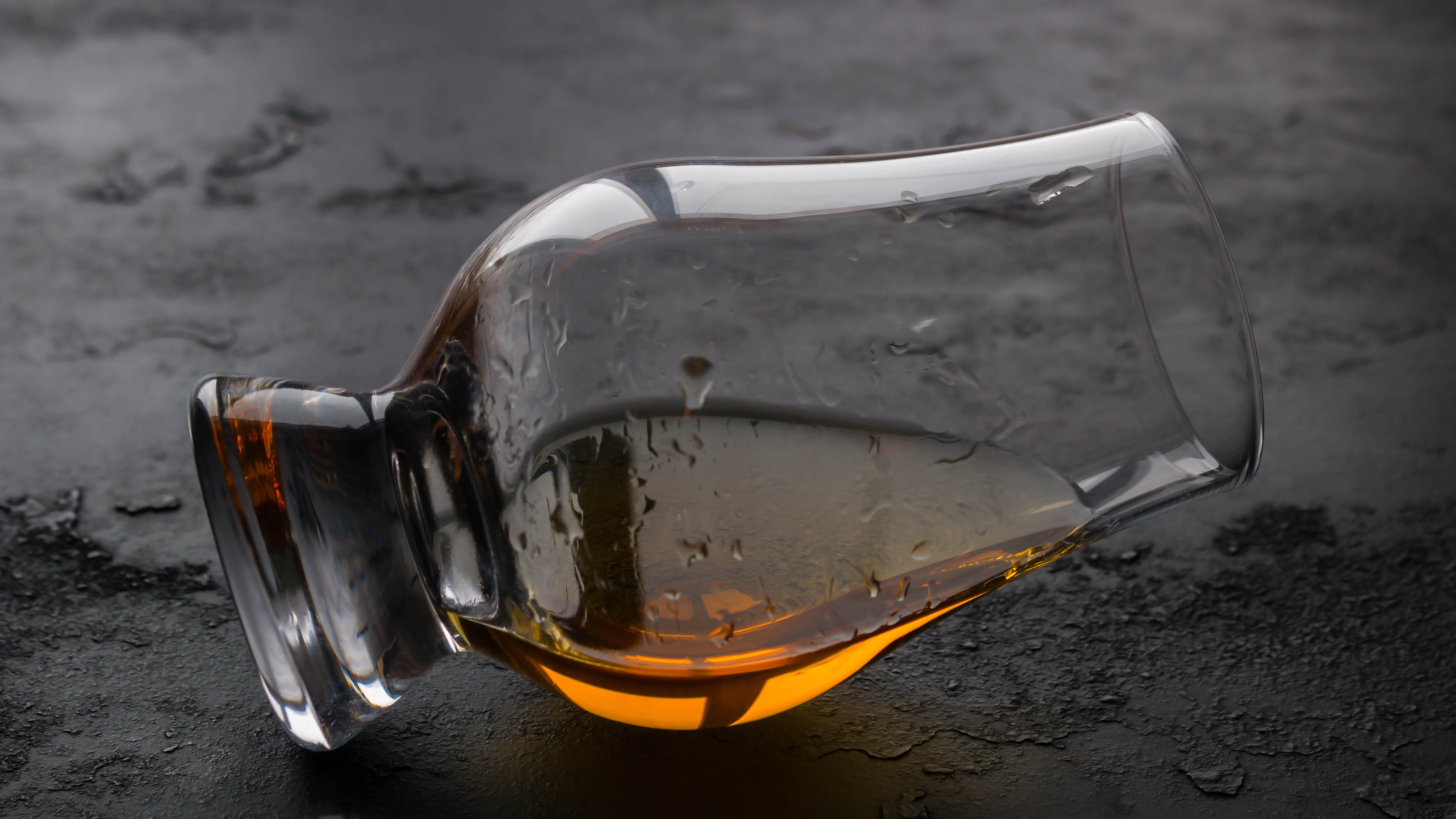 whisky-whisky-glass-laying-on-side.jpg