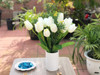 Cream Tulip and Mixed Faux Flower Arrangements With White Ceramic Vase