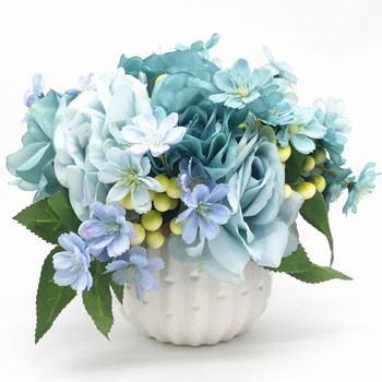 Sky Blue Open Rose and Mixed Flower Arrangement With White Ceramic Vase