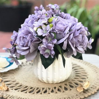 Purple Open Rose and Mixed Flower Arrangement With White Ceramic Vase