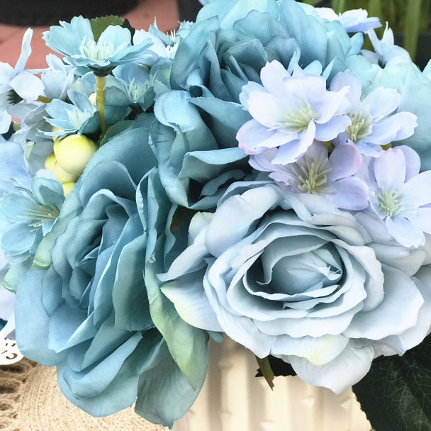 Sky Blue Open Rose and Mixed Flower Arrangement With White Ceramic Vase Sky Blue Open Rose and Mixed Flower Arrangement With White Ceramic Vase