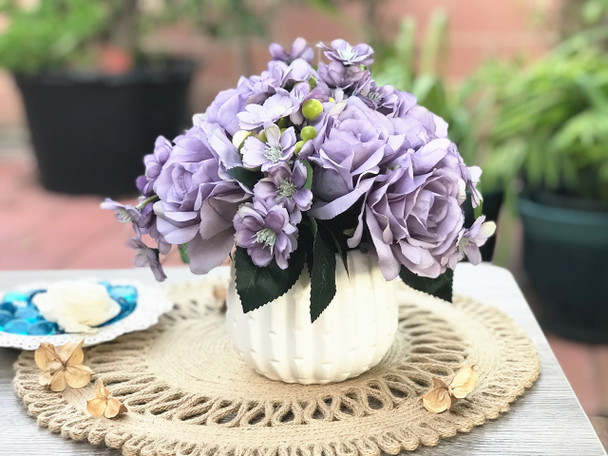 Purple Open Rose and Mixed Flower Arrangement With White Ceramic Vase