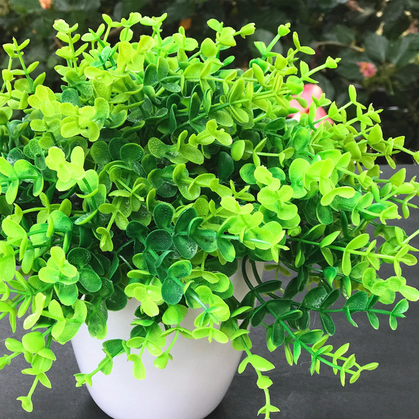 Artificial Eucalyptus Grass in Round Decorative Vase Artificial Eucalyptus Grass in Round Decorative Vase