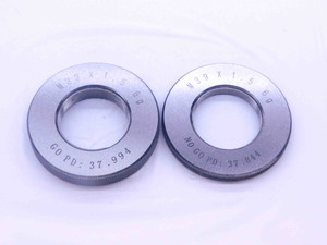 NEW M39 X 1.5 6g SOLID THREAD RING GAGES 39 GO NO GO P.D.'S = 37.994 & 37.844 - DW33437MJ NEW M39 X 1.5 6g SOLID THREAD RING GAGES 39 GO NO GO P.D.'S = 37.994 & 37.844 - DW33437MJ