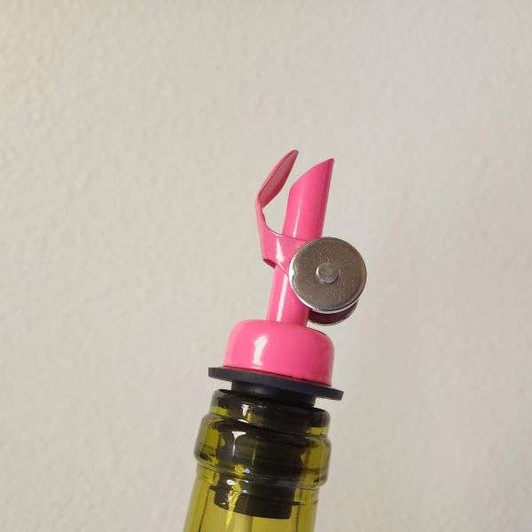 Pouring Pink Pour Spout from The Olive Tap