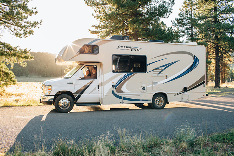 white RV on road