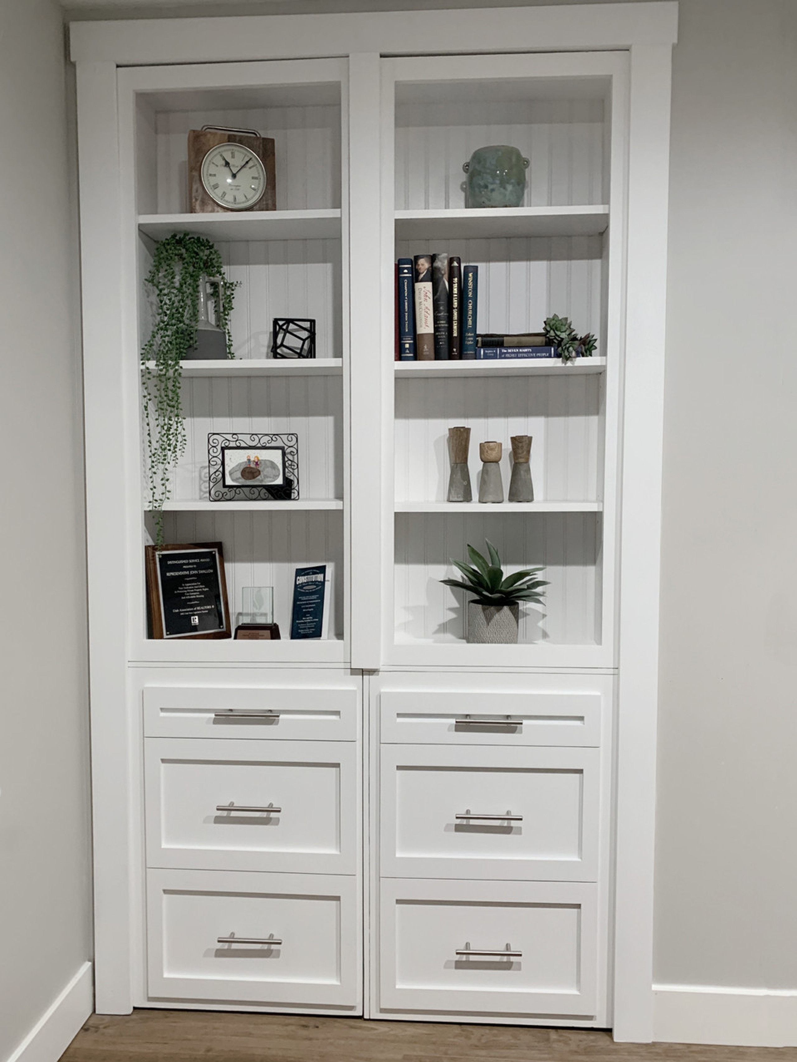 A stylish Closet Door Bookshelf Style with bottom drawers