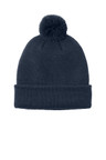 Port Authority cozy pom beanie made with 100% acrylic