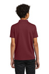 Durable and breathable Port Authority youth polo with pearlized dyed-to-match buttons