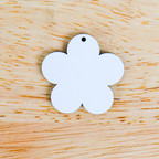 Two-sided hardboard earrings for personalized designs.