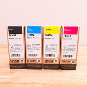 Set of four Epson T49M sublimation ink bottles in black, cyan, magenta, and yellow Set of four Epson T49M sublimation ink bottles in black, cyan, magenta, and yellow