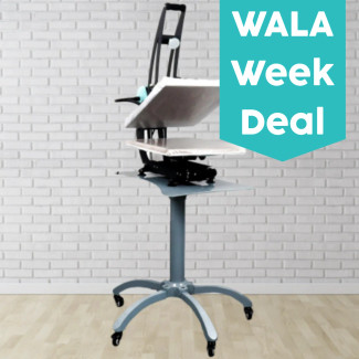 Wala Week Deal Heat Press Caddie Stand with a 16 x 20 heat press on it against a brick wall 