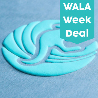 Wala Week Deal Teal Screenprint Puff Transfer on a blue shirt 