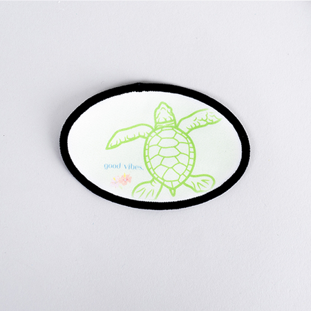 Small oval patch for dye sublimation, perfect for heat pressing logos and designs.