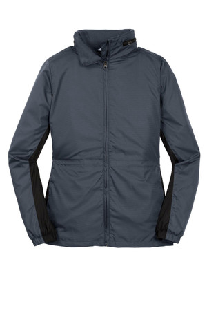 Women's colorblock wind jacket with grid texture, packable hood, and jersey lining for added warmth and comfort.