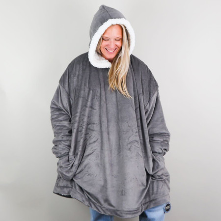 Hooded wearable blanket, oversized, sherpa-lined, fleece fabric, rib-knit cuffs, side pockets for hands, embroidery port feature.