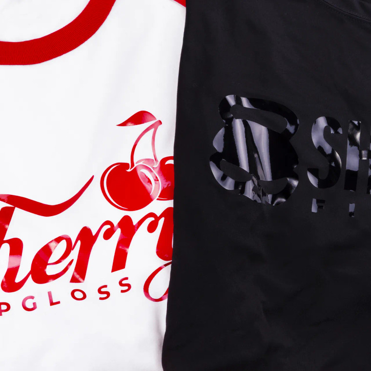 Red and Black Siser Ultra Glossy HTV heat transfer vinyl on white and black background, high-gloss finish, ready for custom designs Red and Black Siser Ultra Glossy HTV heat transfer vinyl on white and black background, high-gloss finish, ready for custom designs