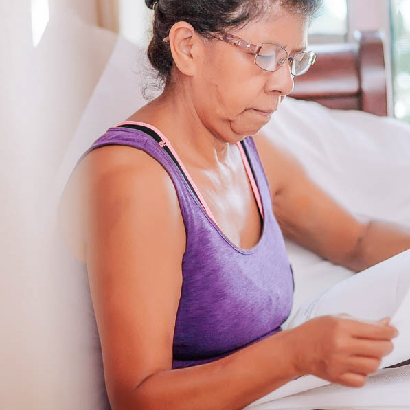 woman looking at paperwork