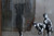 Banksy Peek A Boo Shower Poster - 36" X 24"