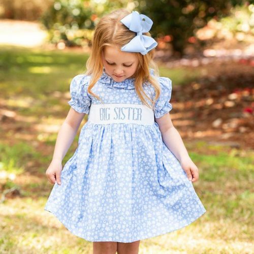 kids in matching smocked outfits