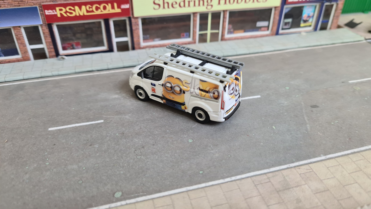 1:76 Code3 transit Custom Minions Sky van