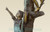 798 Three Boys With Squirrel On Tree- Bronze Sculpture