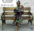 lady reading book on bench