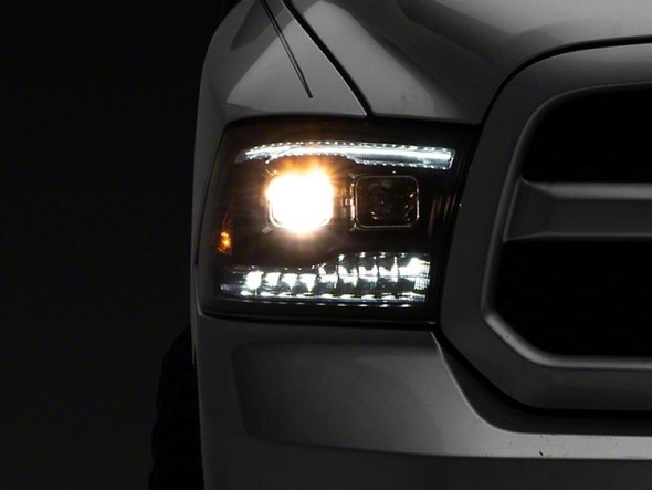 Raxiom 09-18 RAM 1500 LED Projector Headlights w/ Switchback Turn Signals- Blk Housing (Clear Lens) R111520
