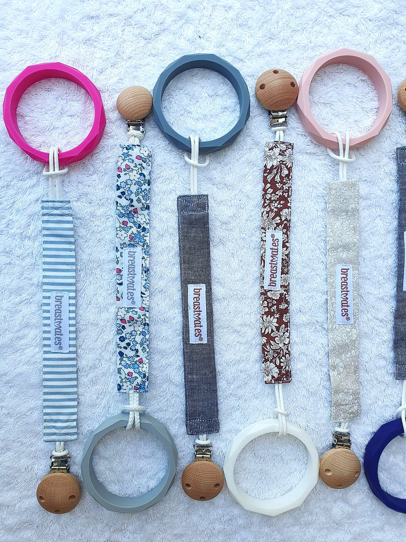 Non-toxic food-grade silicone teething bracelet with round disc texture.