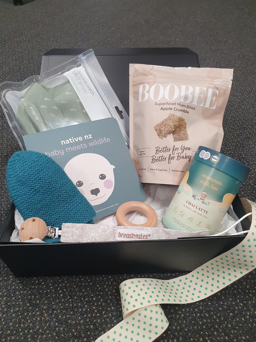 A Soothing Gift for the New Parents

Created in serene shades of jade green, the Jade Glow gift box is thoughtfully designed to bring calm and comfort to the new mum. Each item inside is selected to support her physically and emotionally, from nourishing snacks to sweet, practical pieces for her little one.

Great for a baby shower or postpartum gift, Jade Glow offers a moment of rest and recognition for the woman behind the newborn.

The treasure box includes:

Lactation Bites - Apple Crumble 
Lactation Chai Latte
native nz baby meets wildlife book
Silicone Bib and Spoon in travel pouch
Wool Beanie Emerald
Dummy Clip Beige
Beech Wood Teething Ring
Free Gift Wrapping
Free Mini Message Card