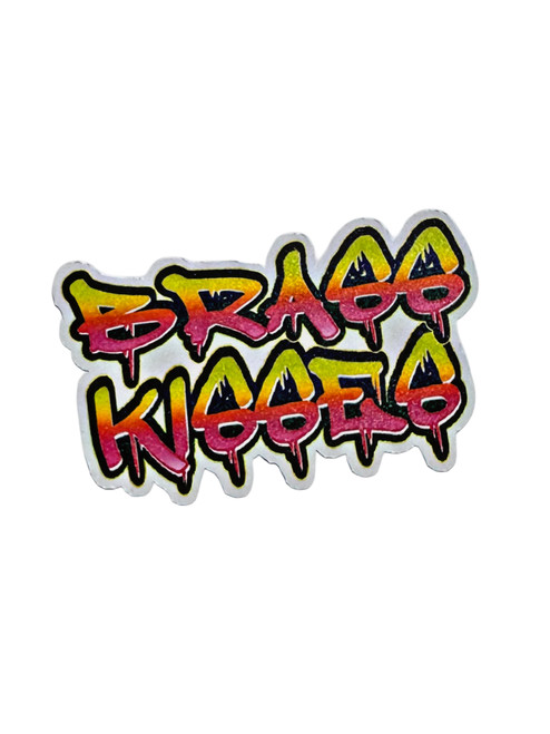 BK Rattle Can sticker — high-gloss, weatherproof die-cut Brass Kisses decal, approximately 2.5 inches. Veteran-owned brand accessory.