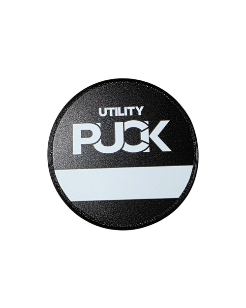 Close up of utility puck packaging
