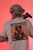Model wearing the BK Chambered Your Way Tee, back view — showing the full back print of the exclusive 2A drop tee.