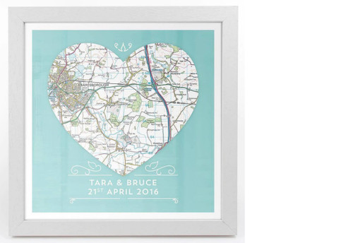 Ivory framed heart map on blue back ground, with your names and wedding date