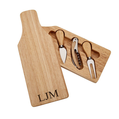 Personalized wooden cheese board in the shape of a wine bottle, with cheese fork, cheese knife and wine bottle opener