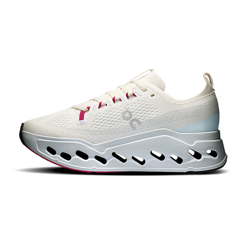 On Women's Cloudsurfer Max 1 Running Shoes, athletic white running shoe with cushioned sole, breathable mesh upper, and red accents on laces.