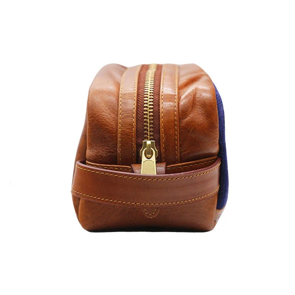 Smathers & Branson Toiletry Bag, leather travel toiletry organizer with a zipper closure and a side pocket for toiletries.