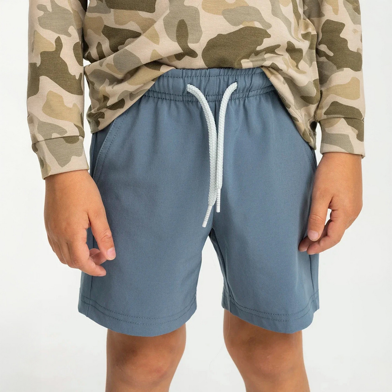 Free Fly Apparel Free Fly Toddler Breeze Short, blue toddler shorts with a white drawstring and elastic waistband.