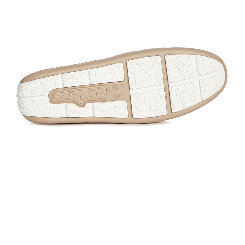 Floafers Sunset Slide, view of the sole showing the beige and white design with textured patterns for grip and style.