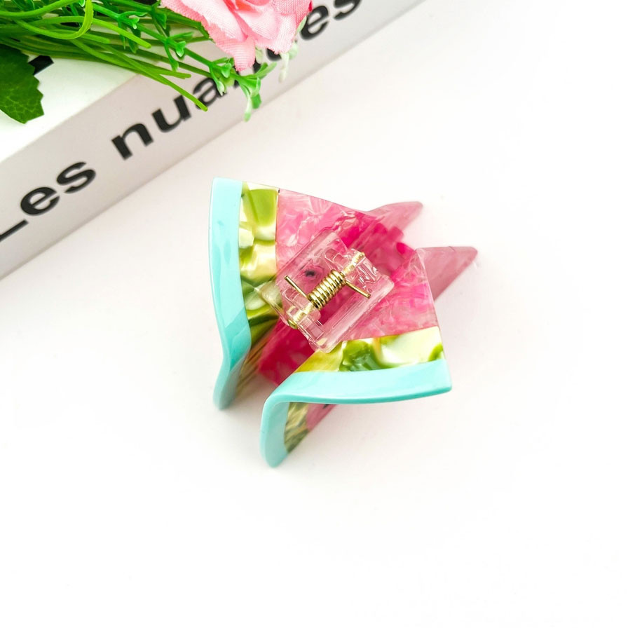 TheDivaSoap Triangular Watermelon Claw Clip, colorful pink, green, and blue patterned hair accessory with a spring mechanism for hair styling.