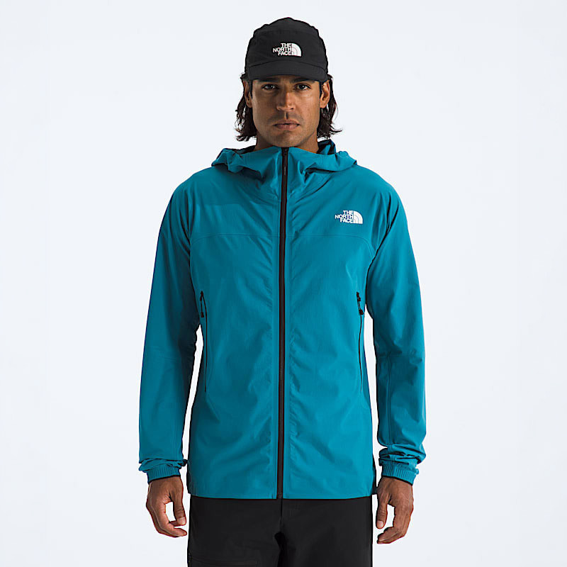 The North Face Men's Summit Off Width Jacket, a blue outdoor waterproof jacket with a hood and zippered pockets, designed for mountain climbing and outdoor adventures.