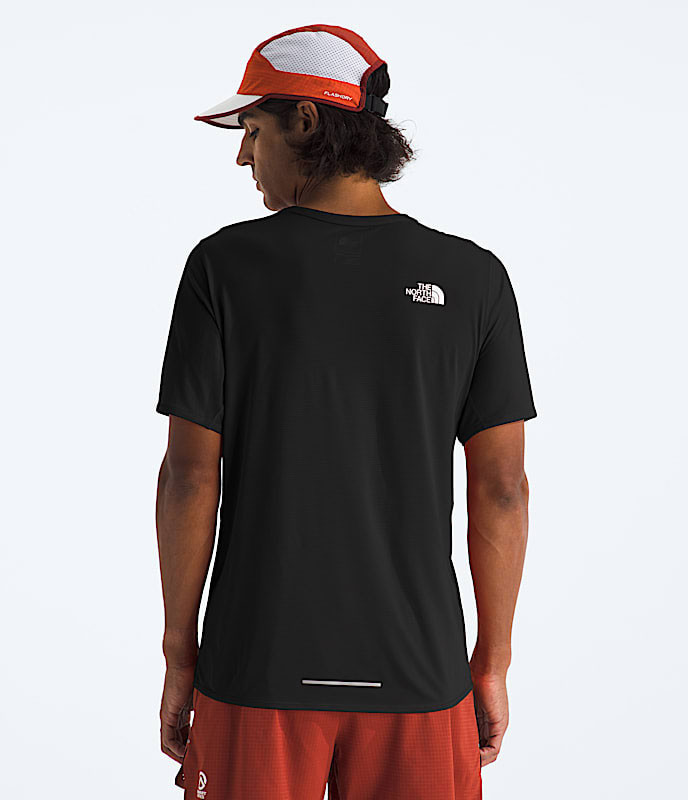 The North Face Men's Summit High Trail Short Sleeve, a black lightweight athletic T-shirt with the North Face logo on the back, designed for outdoor hiking and trail running.