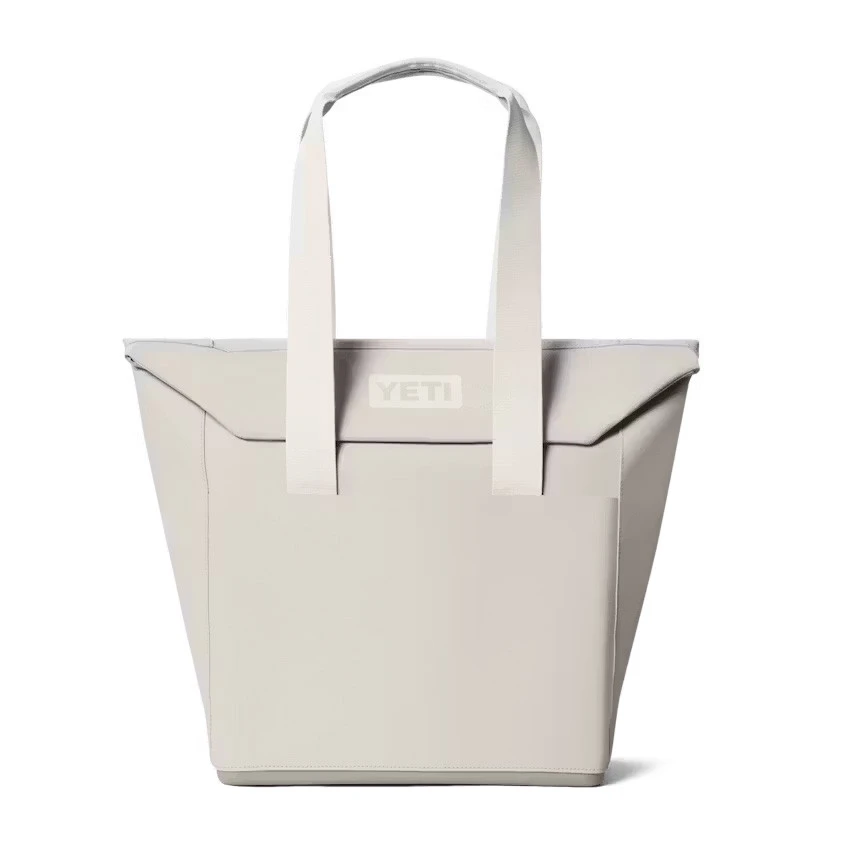 YETI Coolers Yeti Daytrip 20L Insulated Tote Bag, white portable insulated tote with sturdy handles and YETI logo, perfect for keeping food and beverages cool on the go.