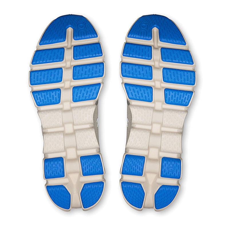 On Running Men's Cloud X 5, sole view showing white and blue cushioned athletic shoe soles designed for comfort and performance.