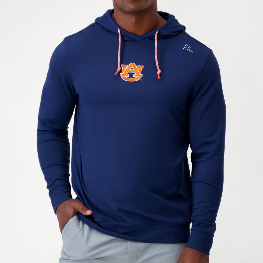 Rhoback Men's Hesi Collegiate AU Logo Hoodie - Auburn, blue hoodie with Auburn University logo, front view of a man wearing the hoodie with hands in pockets.