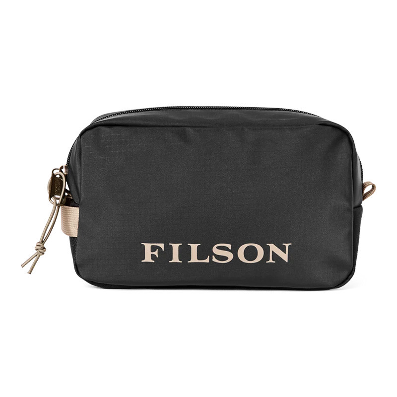 Filson Outdoor Clothing & Bags, Filson All-Weather Dopp Kit, black travel toiletry bag with durable fabric and zip closure.